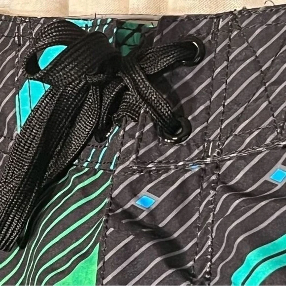 O'Rageous board shorts black green size 34 NWT